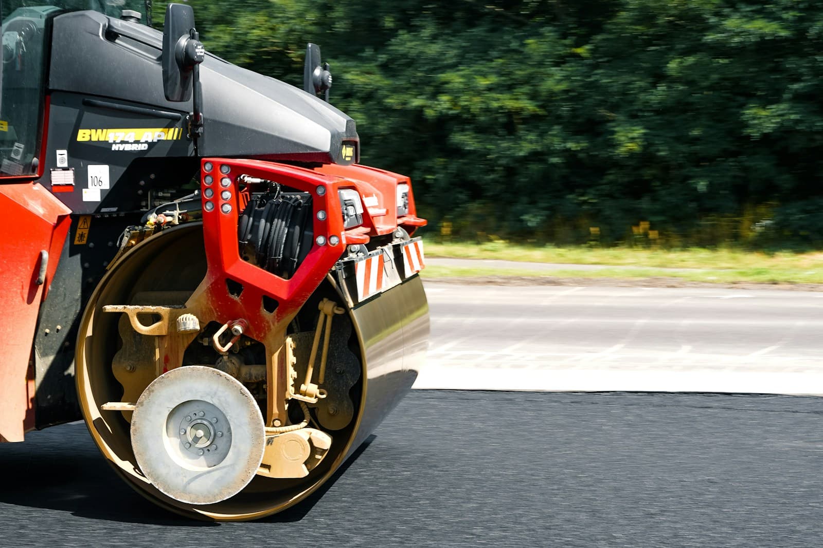 Asphalt paving equipment on a commercial job site